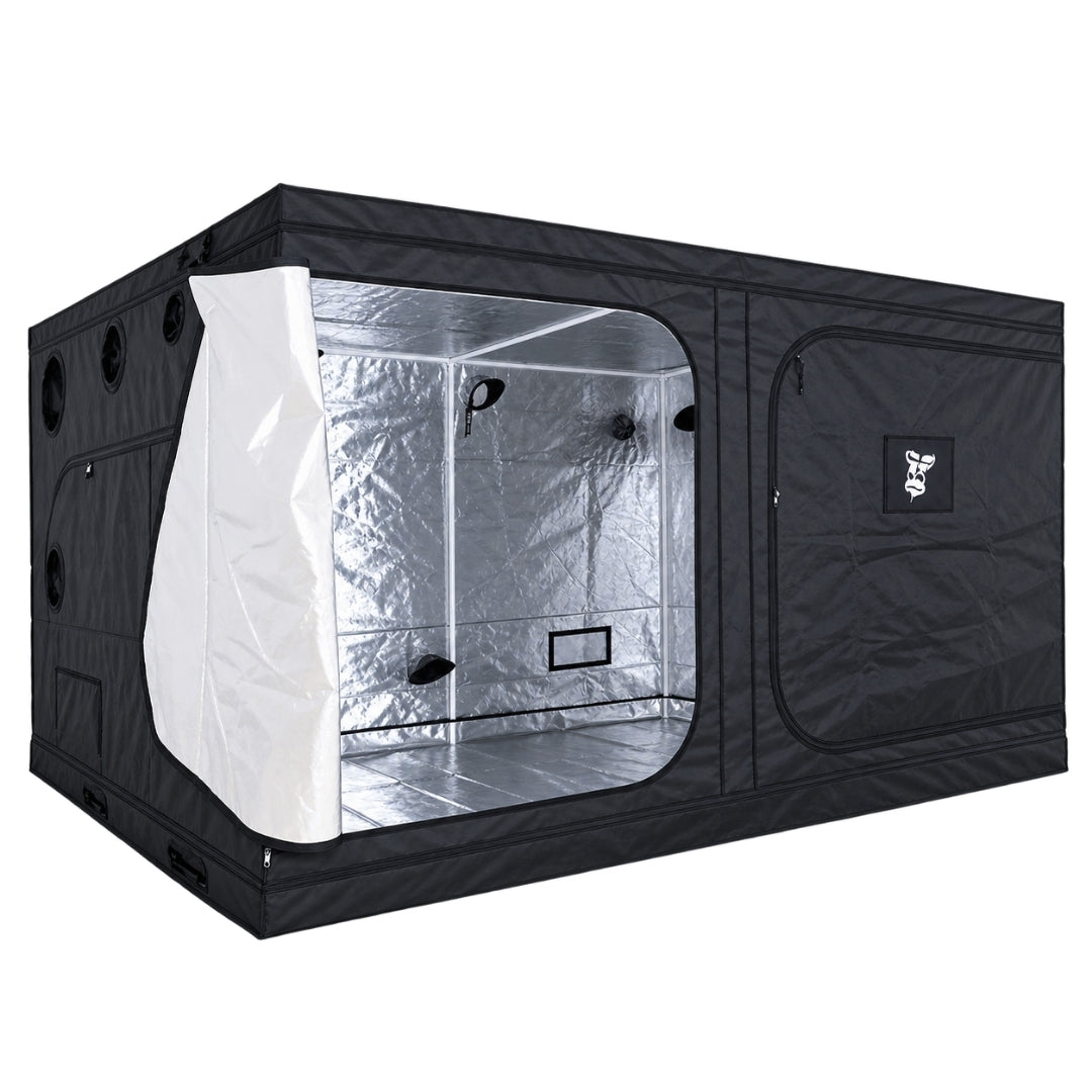 A black GorillaBox Deluxe grow tent measuring 4m-3m-2m with a reflective silver interior, shown with the front door partially open. The tent features a zippered side pocket with a small gorilla logo patch and ventilation holes on the side.