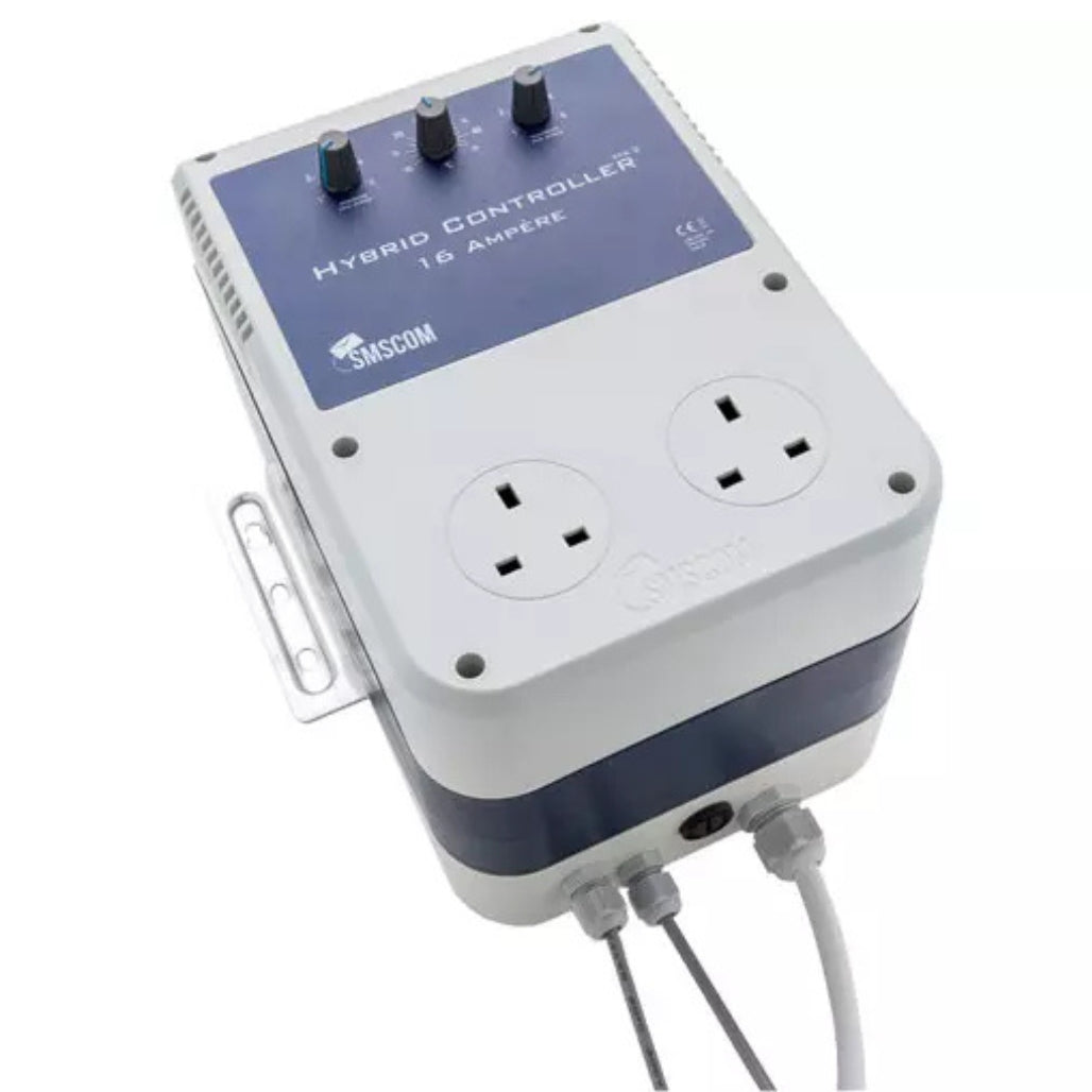 SMSCOM Hybrid Controller 16 Ampere power adapter with dual UK-style wall outlets, three rotary switches, and attached cables, shown on a white background.