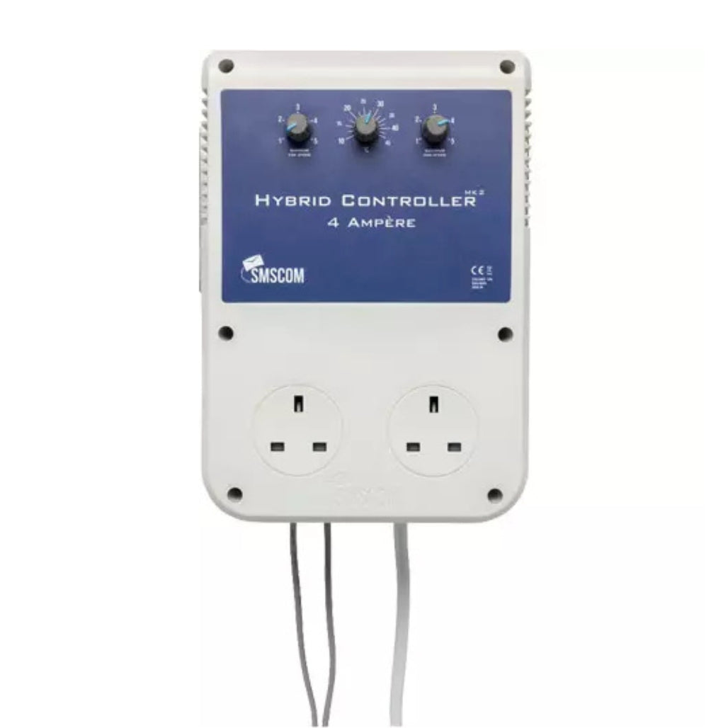 SMSCOM Hybrid Controller 4 Ampere electrical device with dual UK wall outlets, three rotary dials, and a blue front label on a white casing.