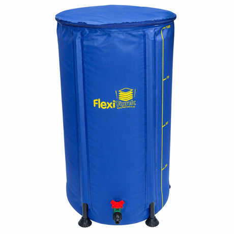 A blue collapsible fabric water tank with a yellow Flexi Tanks logo, yellow measurement markings, a red and green valve, and black feet, shown on a white background.