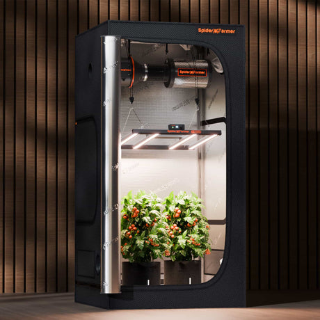 Spider Farmer indoor gardening system with plants on a wooden background