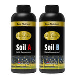 Two bottles of Gold Label Base Nutrient Soil A and Soil B on a white background