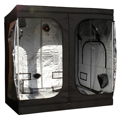 A black GorillaBox Deluxe grow tent measuring 2m-2m-2.2m with a reflective silver interior, shown with the front doors open. The tent features a small gorilla logo patch and ventilation holes on the side.