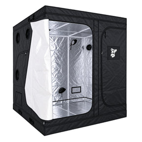 A black GorillaBox Deluxe grow tent measuring 2m-2m-2.2m with a reflective silver interior, shown with the front door partially open. The tent features a zippered side pocket with a small gorilla logo patch and ventilation holes on the side.