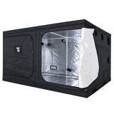 A black GorillaBox Deluxe grow tent measuring 4m-3m-2m with a reflective silver interior, shown with the front door partially open on the right. The tent features a small gorilla logo patch and ventilation holes on the side.