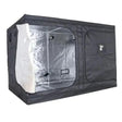 A black GorillaBox Deluxe grow tent measuring 5m-4m-2.2m with a reflective silver interior lining, shown partially open with a door panel pulled out on the left. The tent features a zippered door and a small gorilla logo patch on the front.
