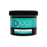 A black plastic jar of OCD Odour Control Developments Aqua Blast Wax Block, featuring a teal and black label with white text, on a solid white background.