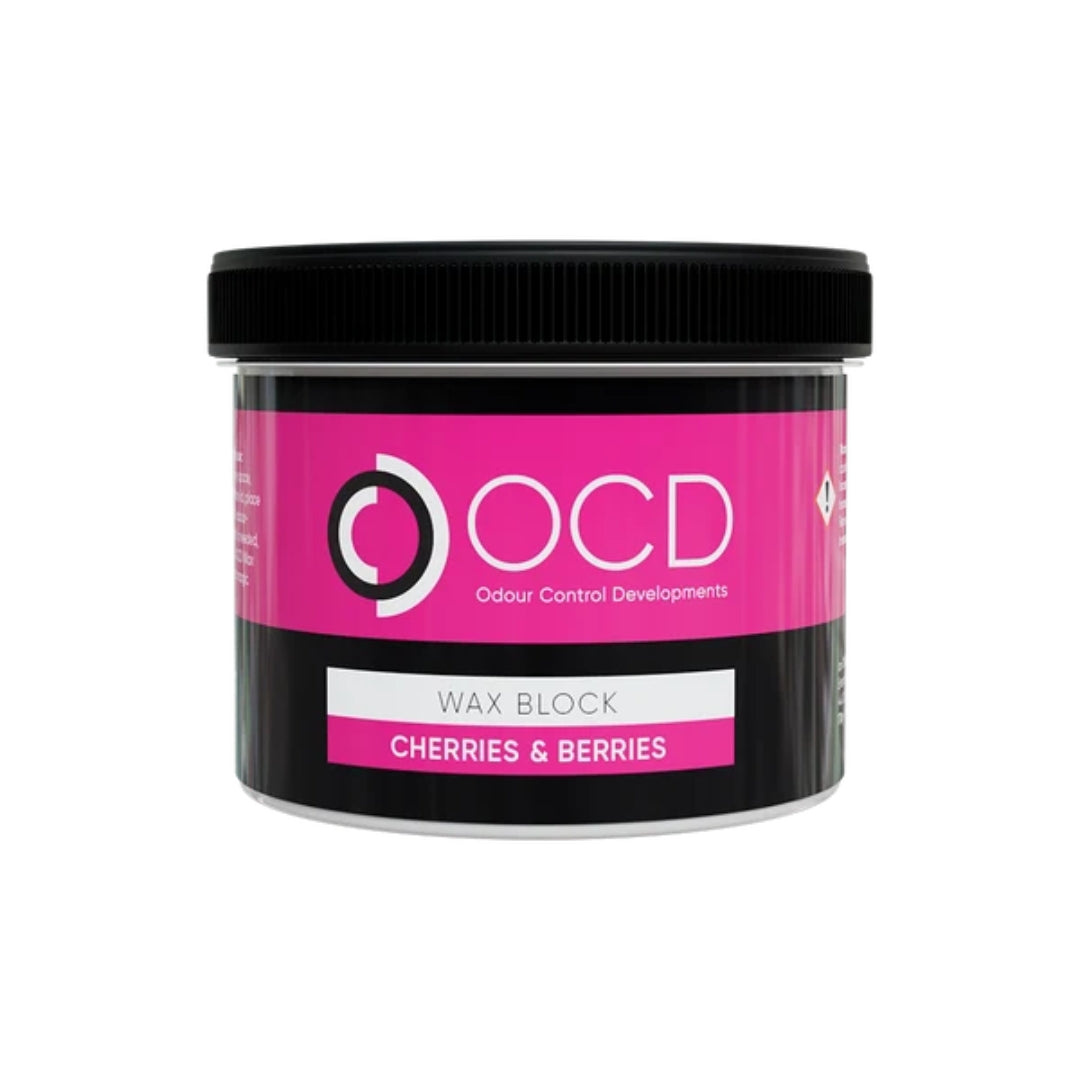 A black plastic jar of OCD Odour Control Developments 'Wax Block' in the 'Cherries & Berries' scent, featuring a vibrant pink label on a white background.
