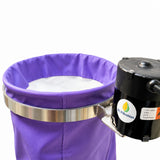 A close-up of a purple fabric filter bag with a silver metal clamp, connected to a black SC Filtration branded vibrating motor on a white background.