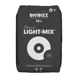 A black bag of BigBizz Original Light-Mix organic fertilizer, featuring white text and a circular target graphic on a plain white background.