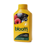 A yellow bottle of SWTNR Bloom Advanced Floriculture organic aromatic enhancer, featuring a label with raspberries and blueberries on a white background.