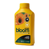 A yellow bottle of bloom Ultra Advanced Floriculture flower enhancer, featuring a dahlia graphic on the label, set against a plain white background.
