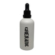 A white bottle with a black dropper cap and the word 'GRENADE' printed vertically in black on the front, isolated on a white background.