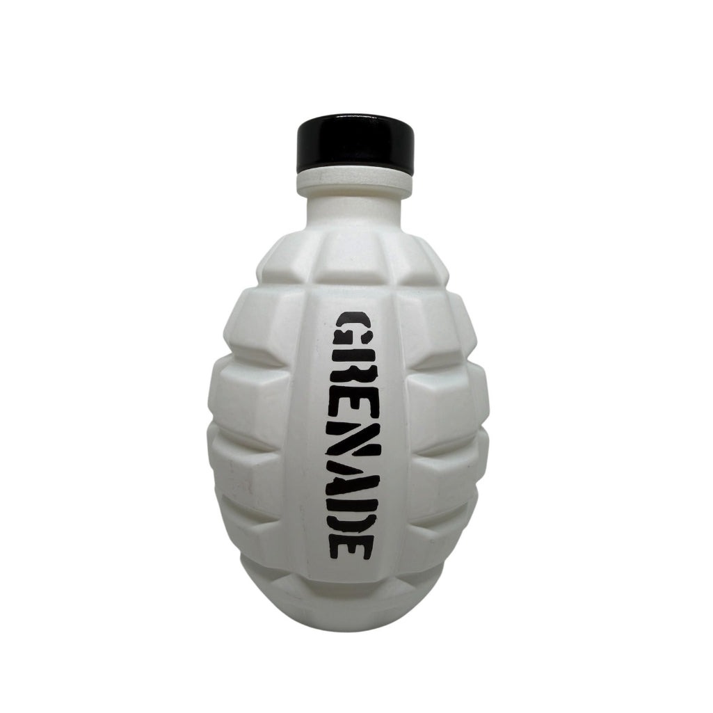 A white grenade-shaped bottle with a black cap and the word 'GRENADE' printed vertically in black on the front, shown against a plain white background.