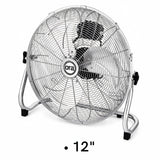 A 12-inch Ora brand industrial floor fan with a silver metal wire grille and stand, shown on a white background with a '12"' text overlay at the bottom.